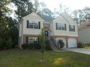 Exterior Front. FABULOUS SPLIT FOYER BOASTING PARTIALLY FINISHED TERRACE LEVEL!