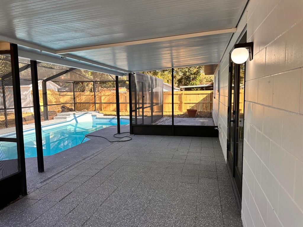 933 Windsor Street Lakeland, FL 33803 - Photo 39 of 47 a view of an empty room with a floor to ceiling window