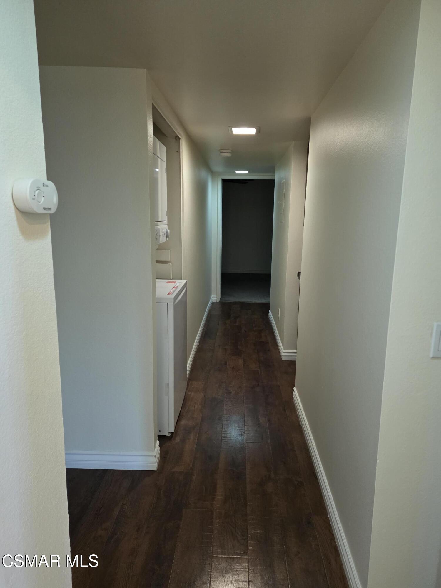 1778 Sinaloa Road, Unit 193 Simi Valley, CA 93065 - Photo 8 of 17 a view of hallway with wooden floor