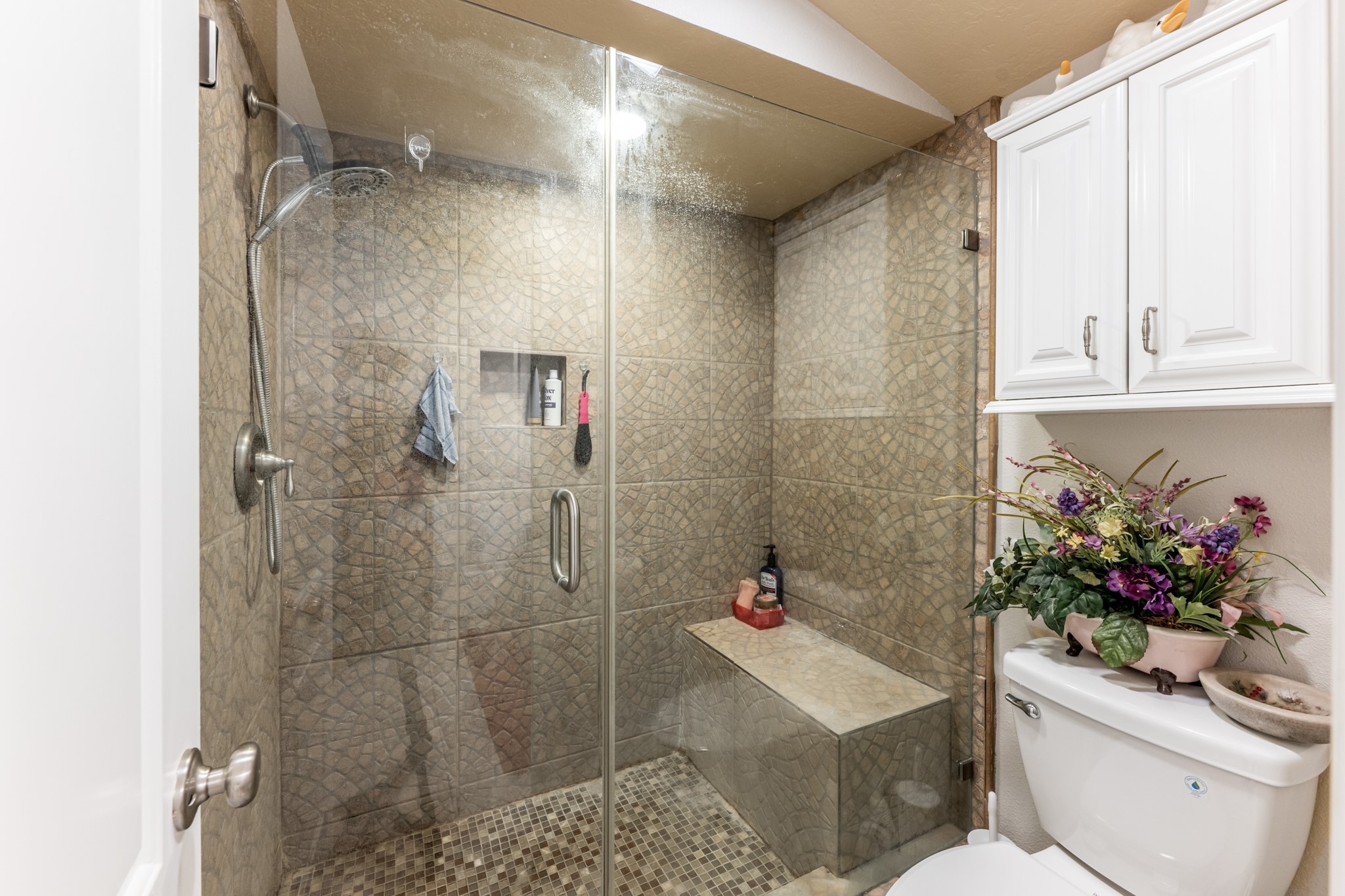 2115 Normal Park Drive Huntsville, TX 77340 - Photo 14 of 23 a bathroom with a sink a toilet and shower