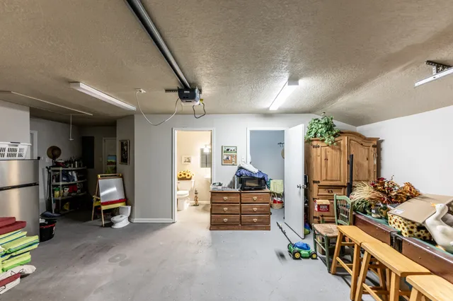 a view of a bedroom with gym equipment