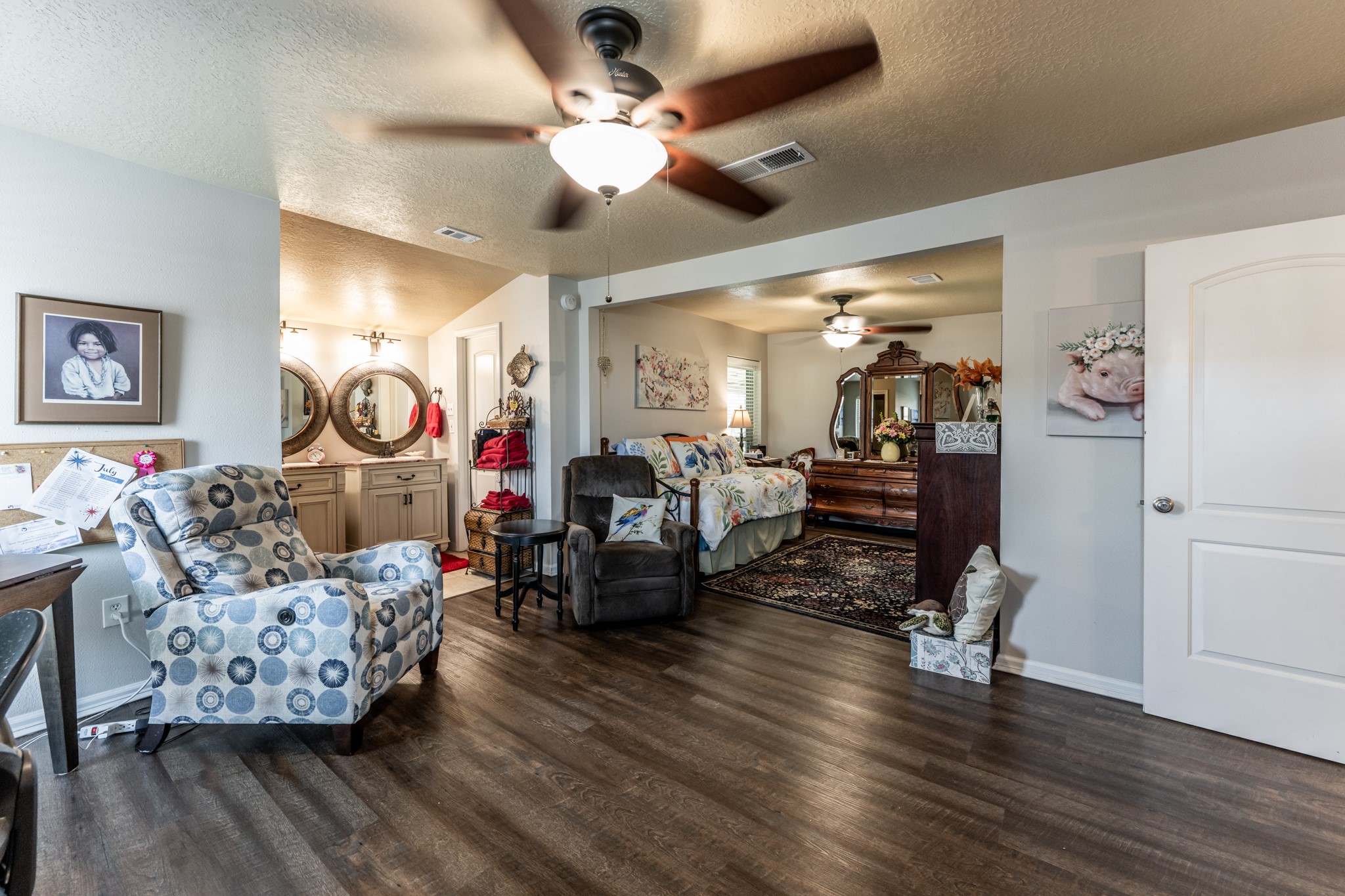 2115 Normal Park Drive Huntsville, TX 77340 - Photo 10 of 23 a living room with furniture and a wooden floor