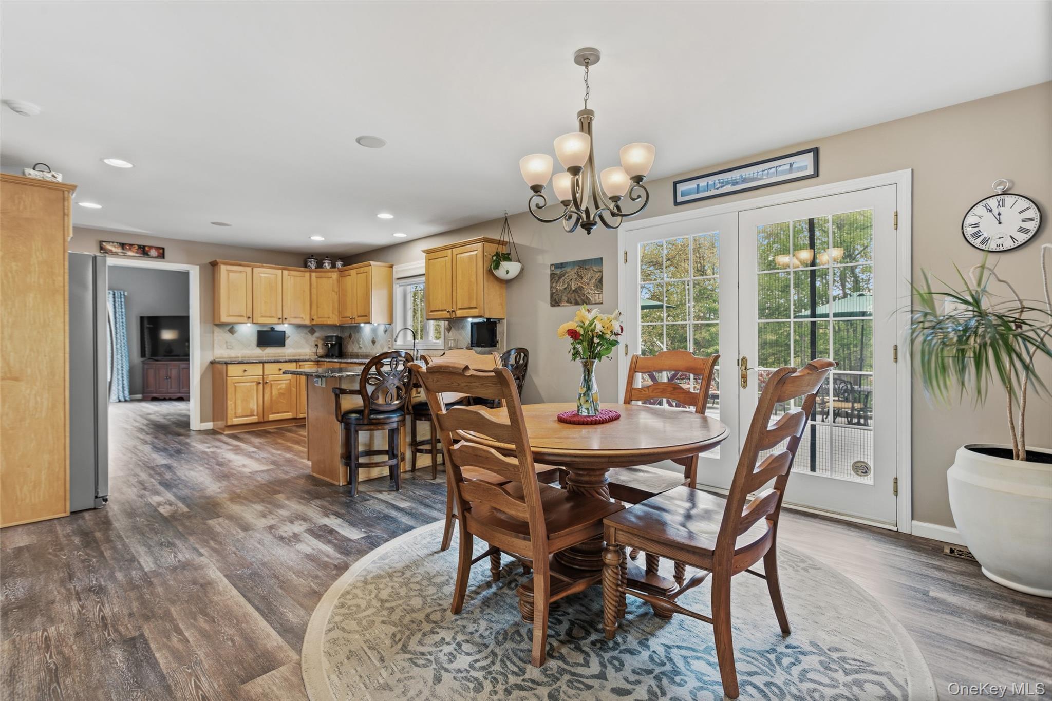 754 Milltown Road Danbury, CT 06811 - Photo 12 of 41 a view of a dining room with furniture window and wooden floor