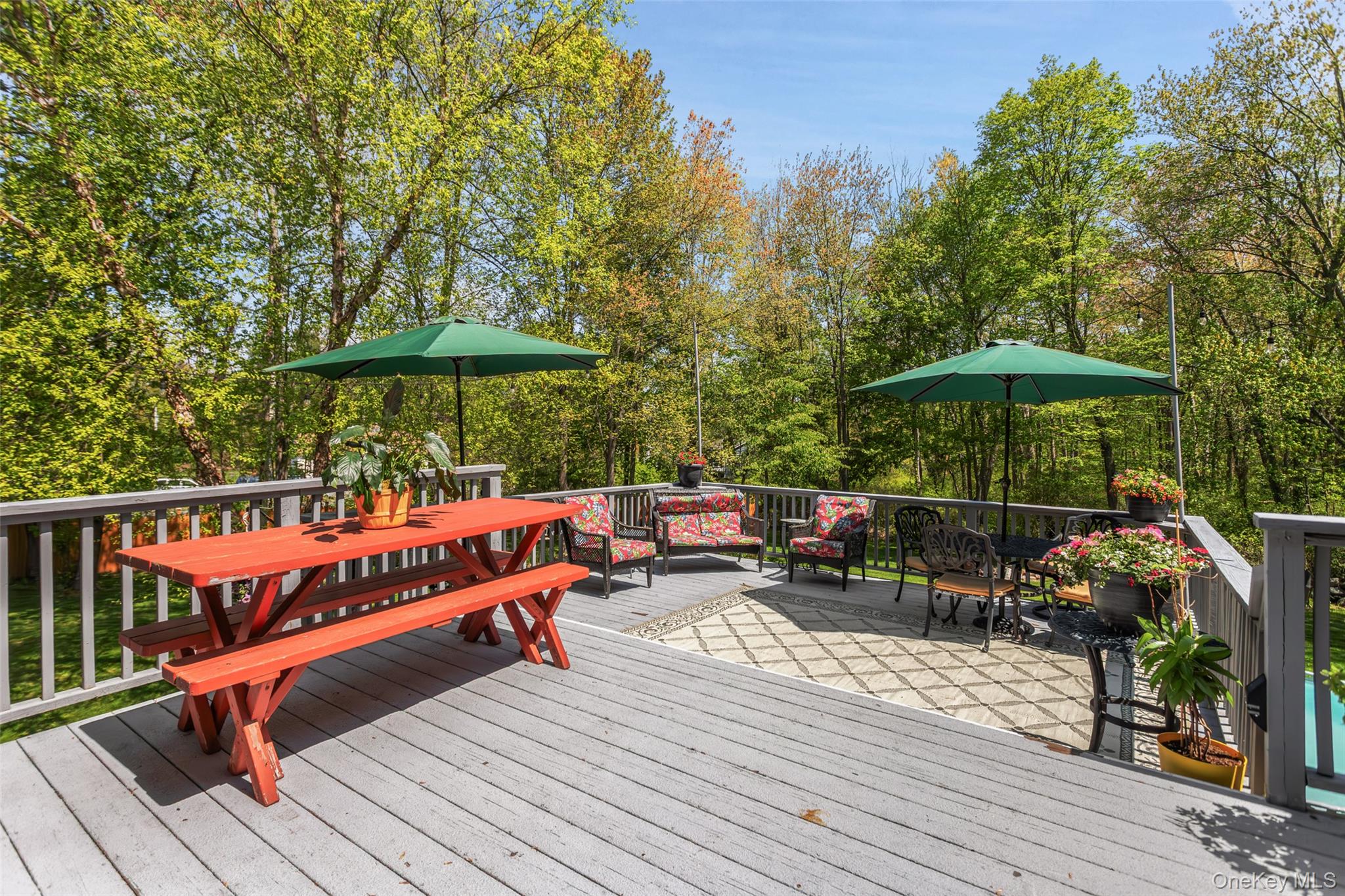 754 Milltown Road Danbury, CT 06811 - Photo 15 of 41 a terrace with outdoor seating and wooden floor