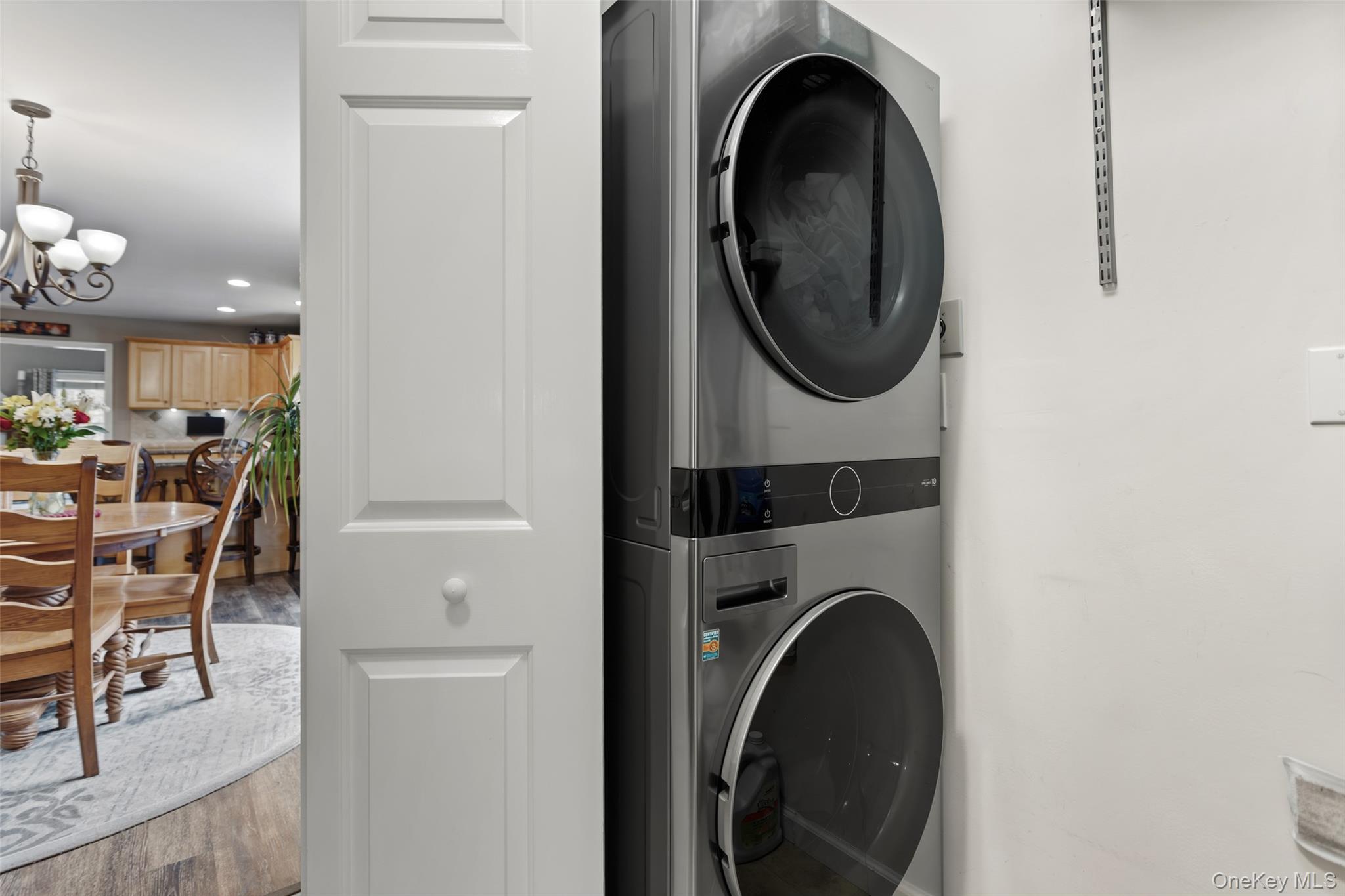 754 Milltown Road Danbury, CT 06811 - Photo 18 of 41 a view of a storage and utility room with washer and dryer