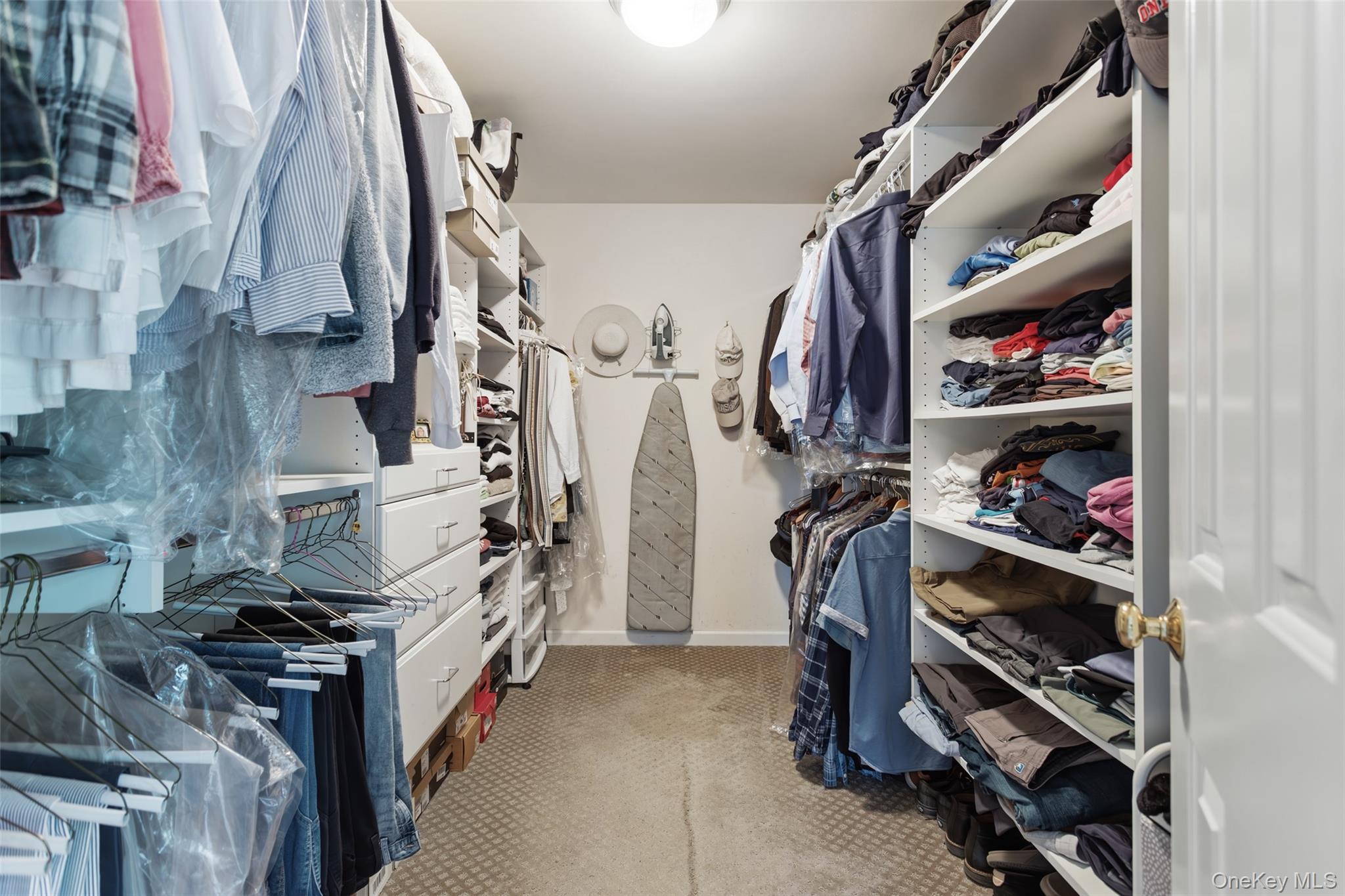 754 Milltown Road Danbury, CT 06811 - Photo 23 of 41 a view of walk in closet with clothes and shoes