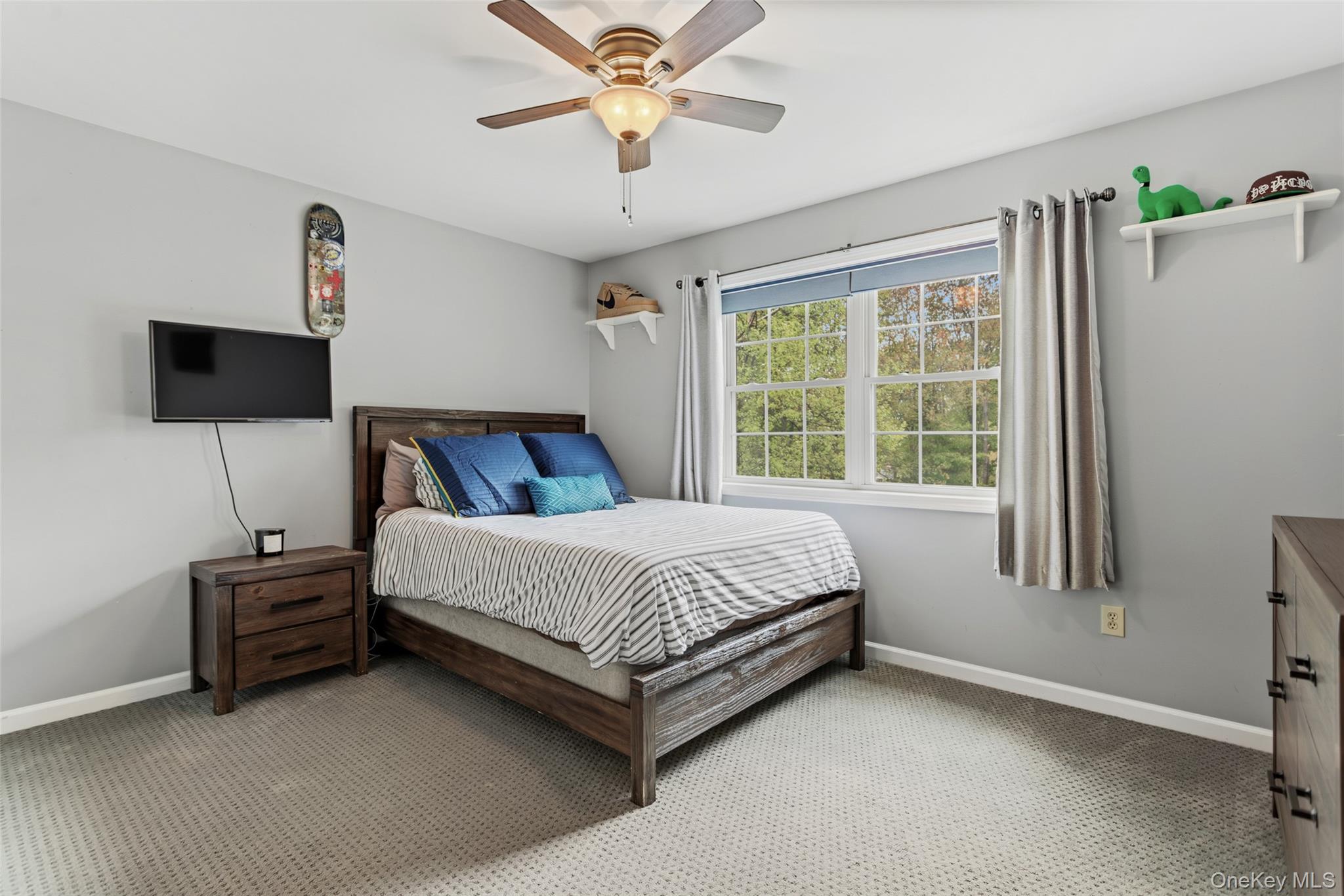 754 Milltown Road Danbury, CT 06811 - Photo 26 of 41 a bed sitting in a spacious bedroom next to a window