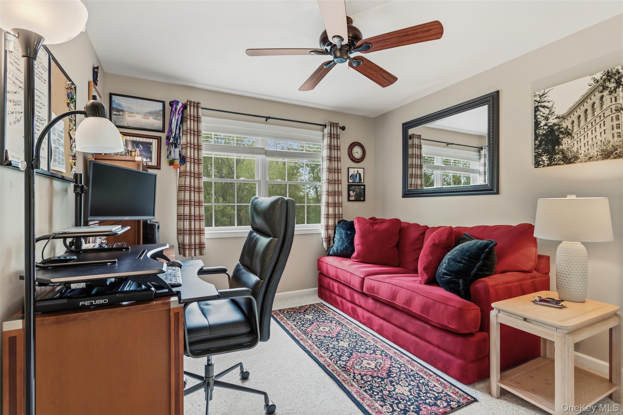 754 Milltown Road Danbury, CT 06811 - Photo 27 of 41 a view of a livingroom with workspace and a couch