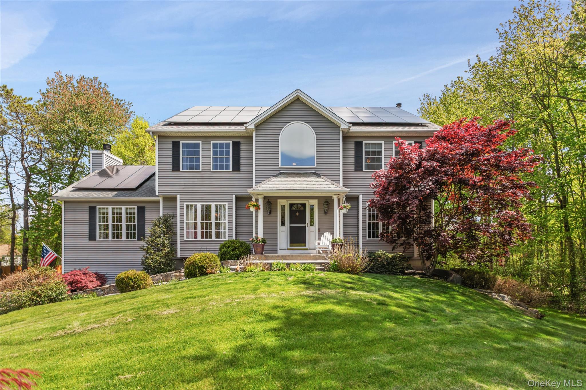 754 Milltown Road Danbury, CT 06811 - Photo 3 of 41 a front view of a house with a garden