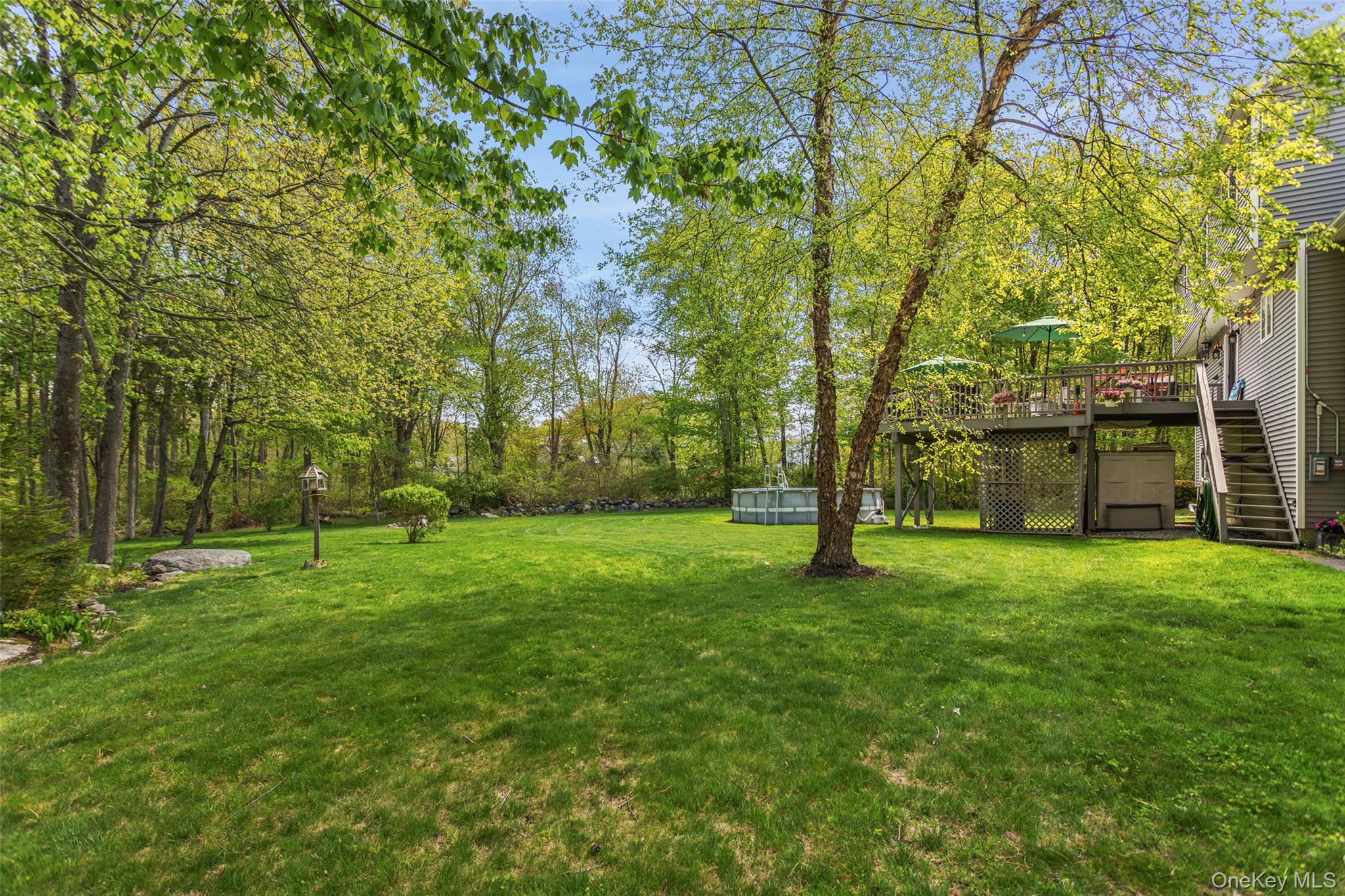 754 Milltown Road Danbury, CT 06811 - Photo 34 of 41 a big yard with lots of green space and trees