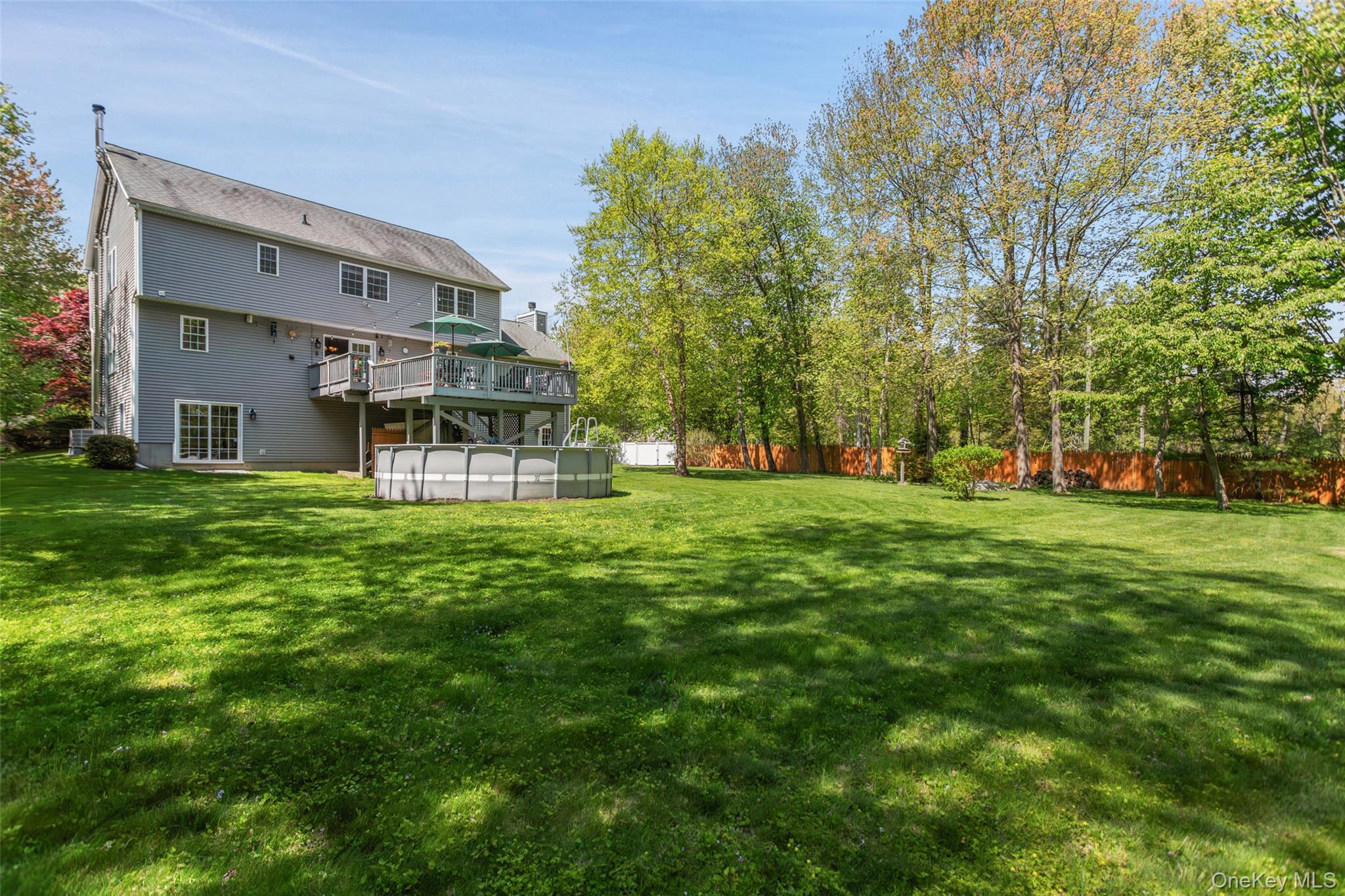 754 Milltown Road Danbury, CT 06811 - Photo 35 of 41 a view of a house with a yard