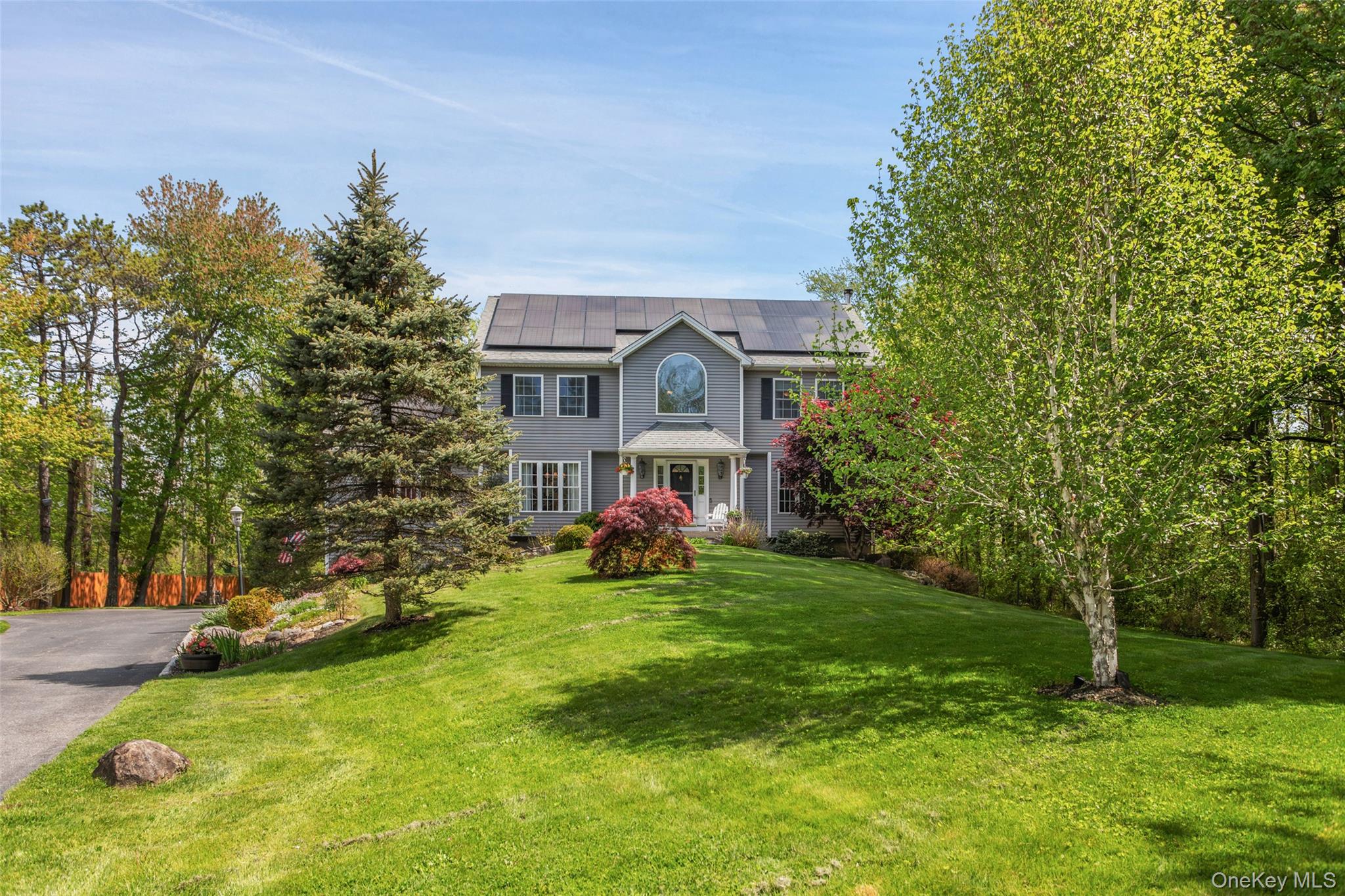 754 Milltown Road Danbury, CT 06811 - Photo 37 of 41 a view of a house with a big yard potted plants and large tree