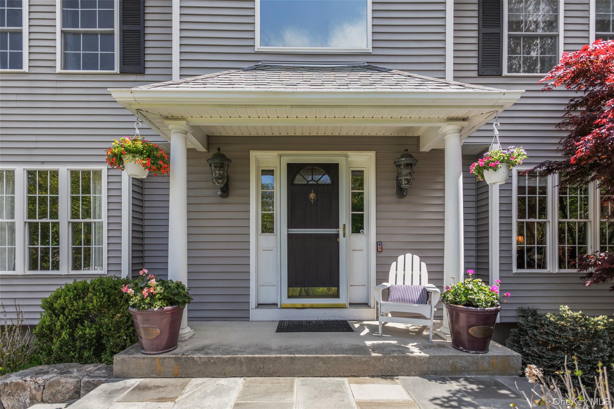 754 Milltown Road Danbury, CT 06811 - Photo 5 of 41 a view of a house with potted plants