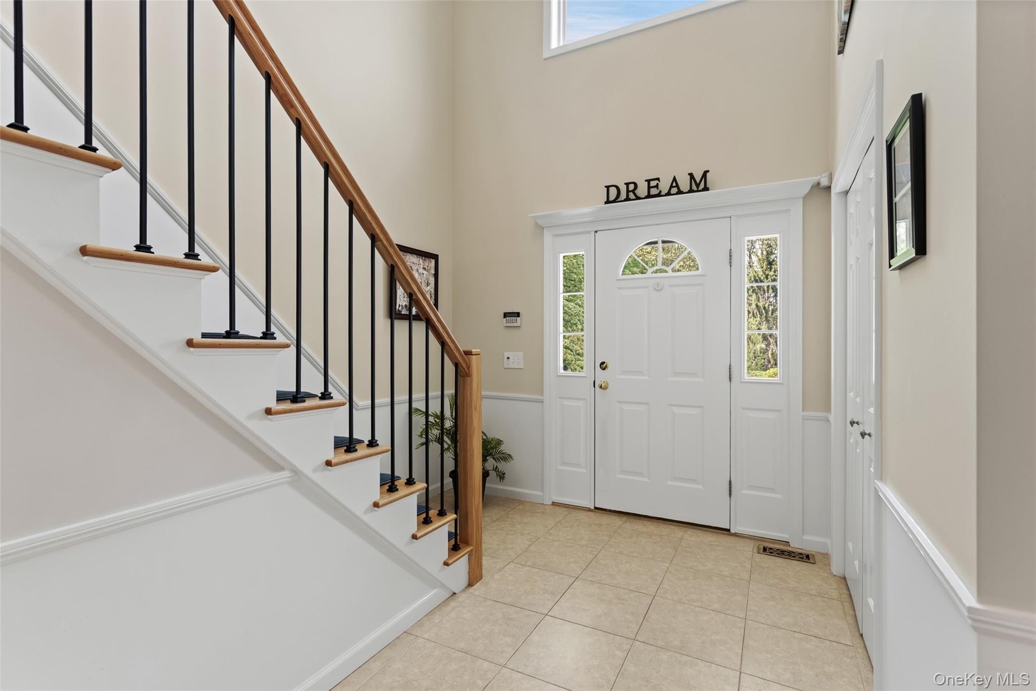 754 Milltown Road Danbury, CT 06811 - Photo 7 of 41 a view of a hallway with entryway and stairs