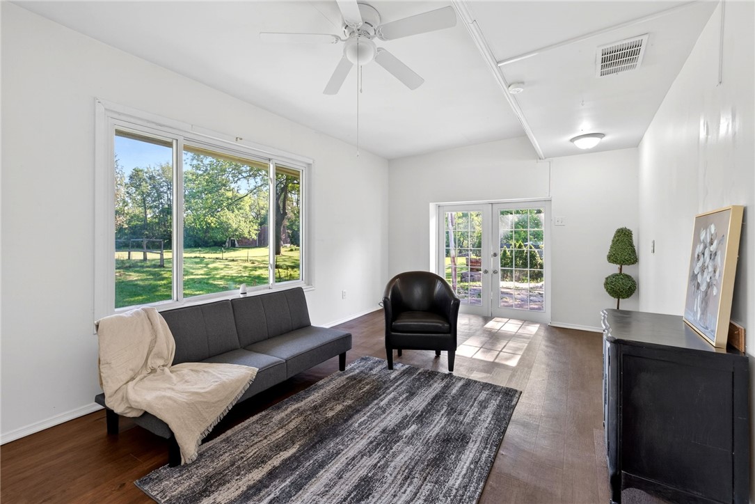2684 Arthur Road Springfield, OH 45502 - Photo 23 of 69 Bright sunroom with expansive windows and convenient outdoor access.