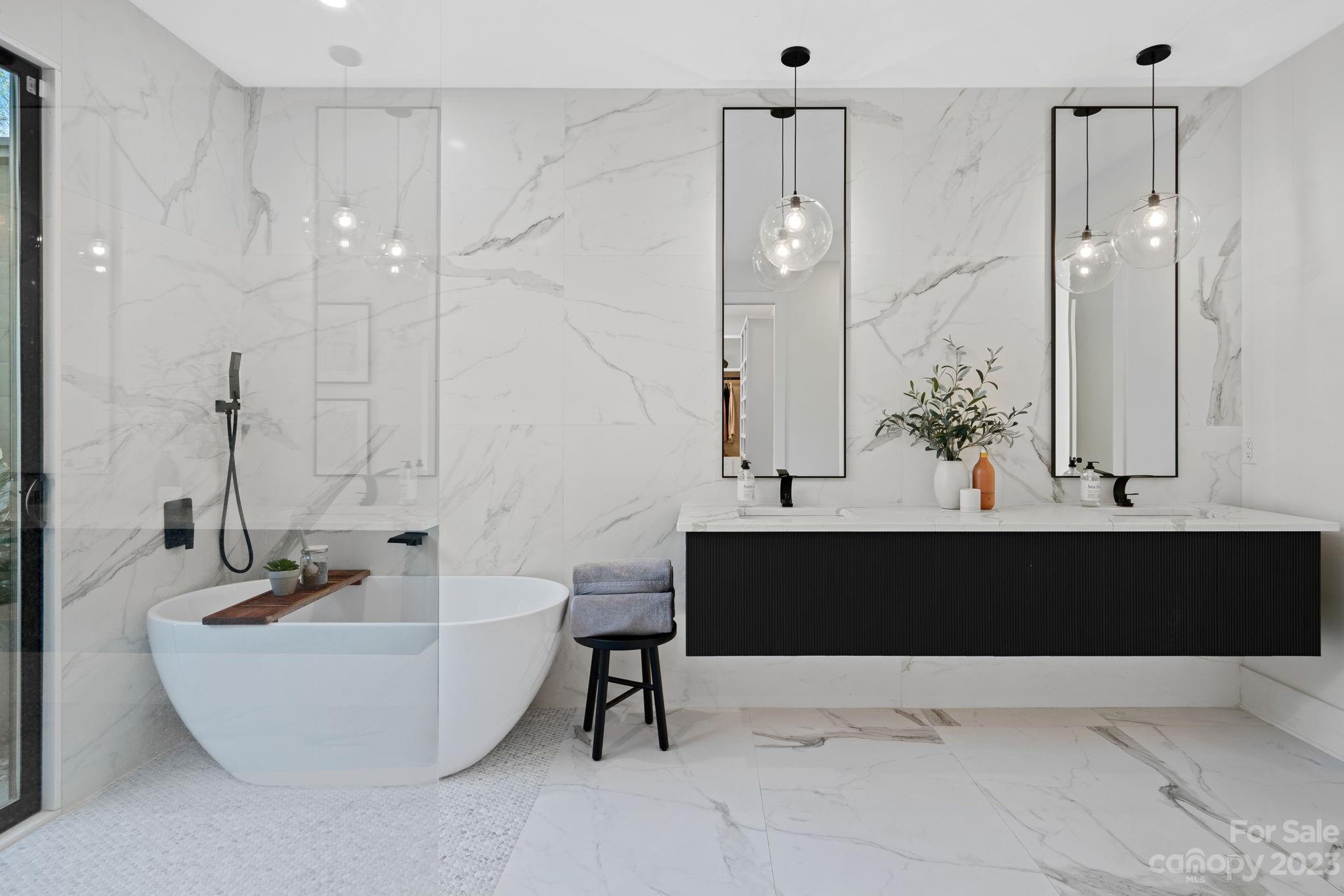 9622 Beatties Ford Road Huntersville, NC 28078 - Photo 25 of 48 a bathroom with a bathtub and a sink