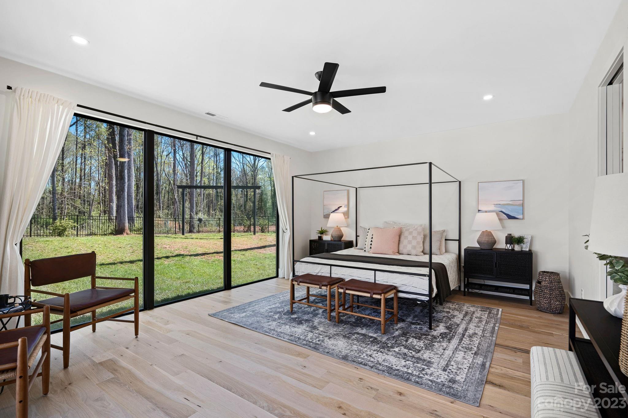 9622 Beatties Ford Road Huntersville, NC 28078 - Photo 34 of 48 a living room with a couch and a table