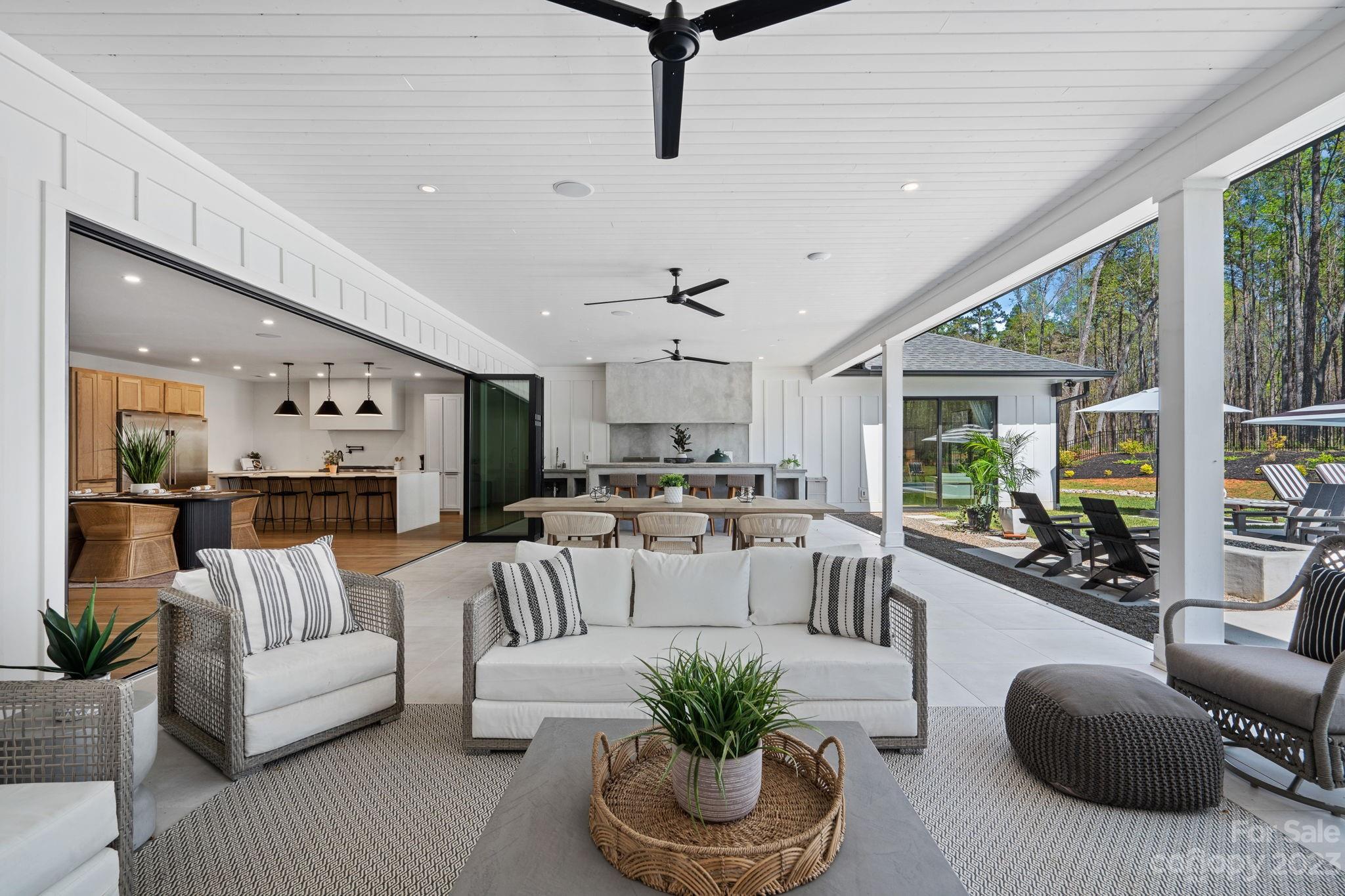 9622 Beatties Ford Road Huntersville, NC 28078 - Photo 42 of 48 a living room with furniture kitchen and a large window