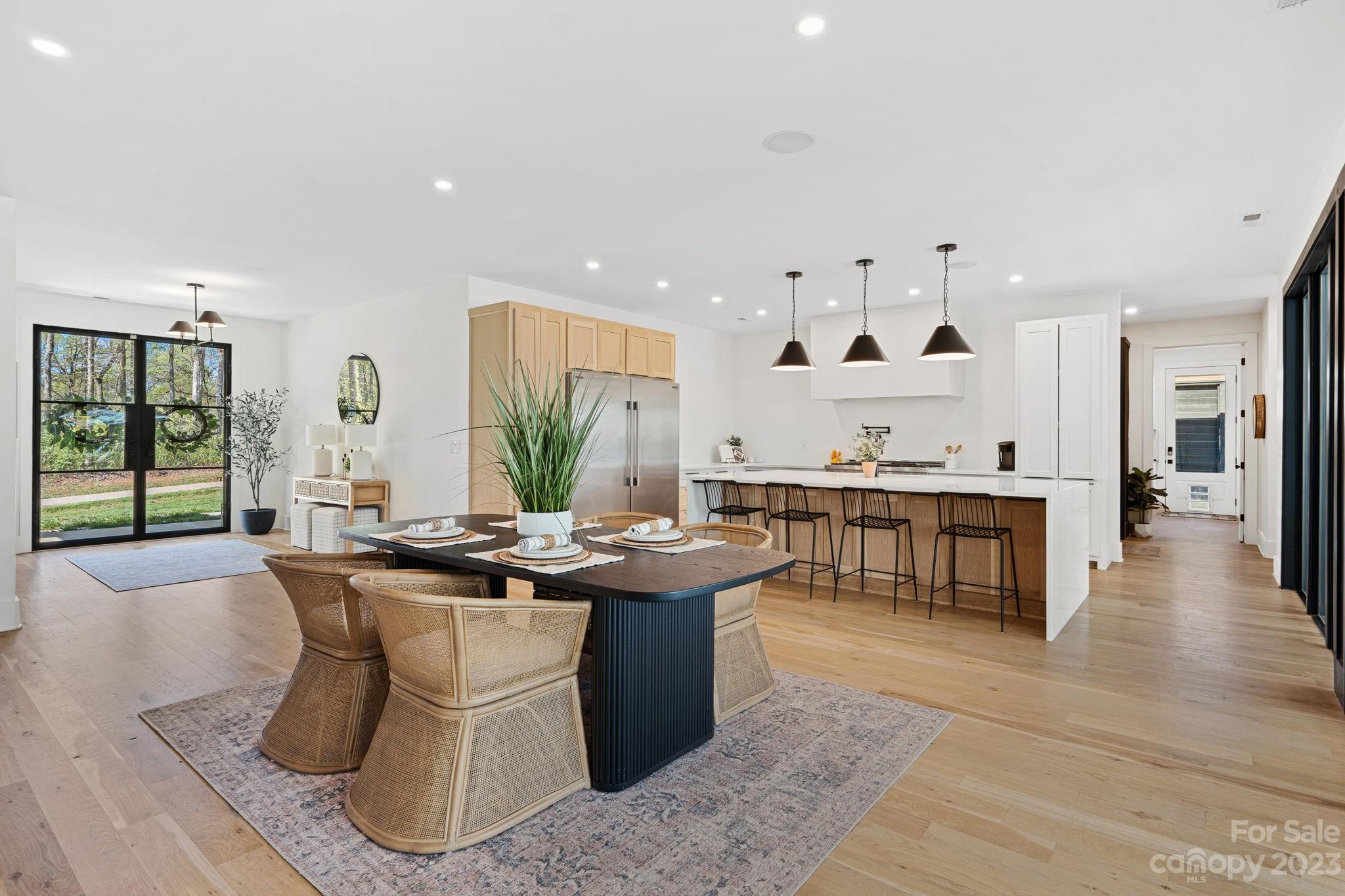 9622 Beatties Ford Road Huntersville, NC 28078 - Photo 7 of 48 a dining hall with granite countertop a stove and a sink
