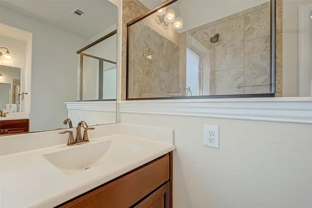 a bathroom with a bathtub sink and toilet