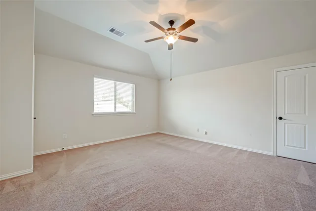 a view of a big room with carpet