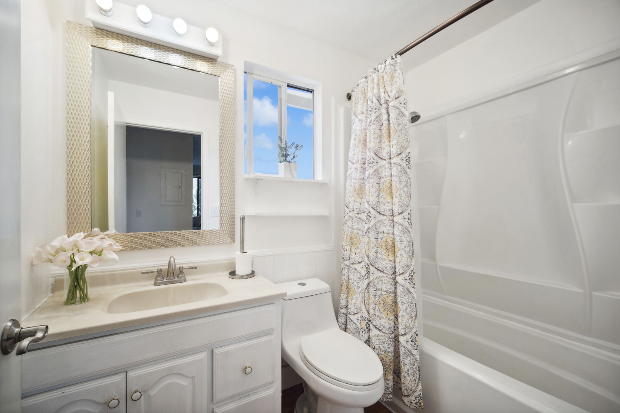 4439 Punee Road Koloa, HI 96756 - Photo 11 of 30 a bathroom with a sink a toilet and shower