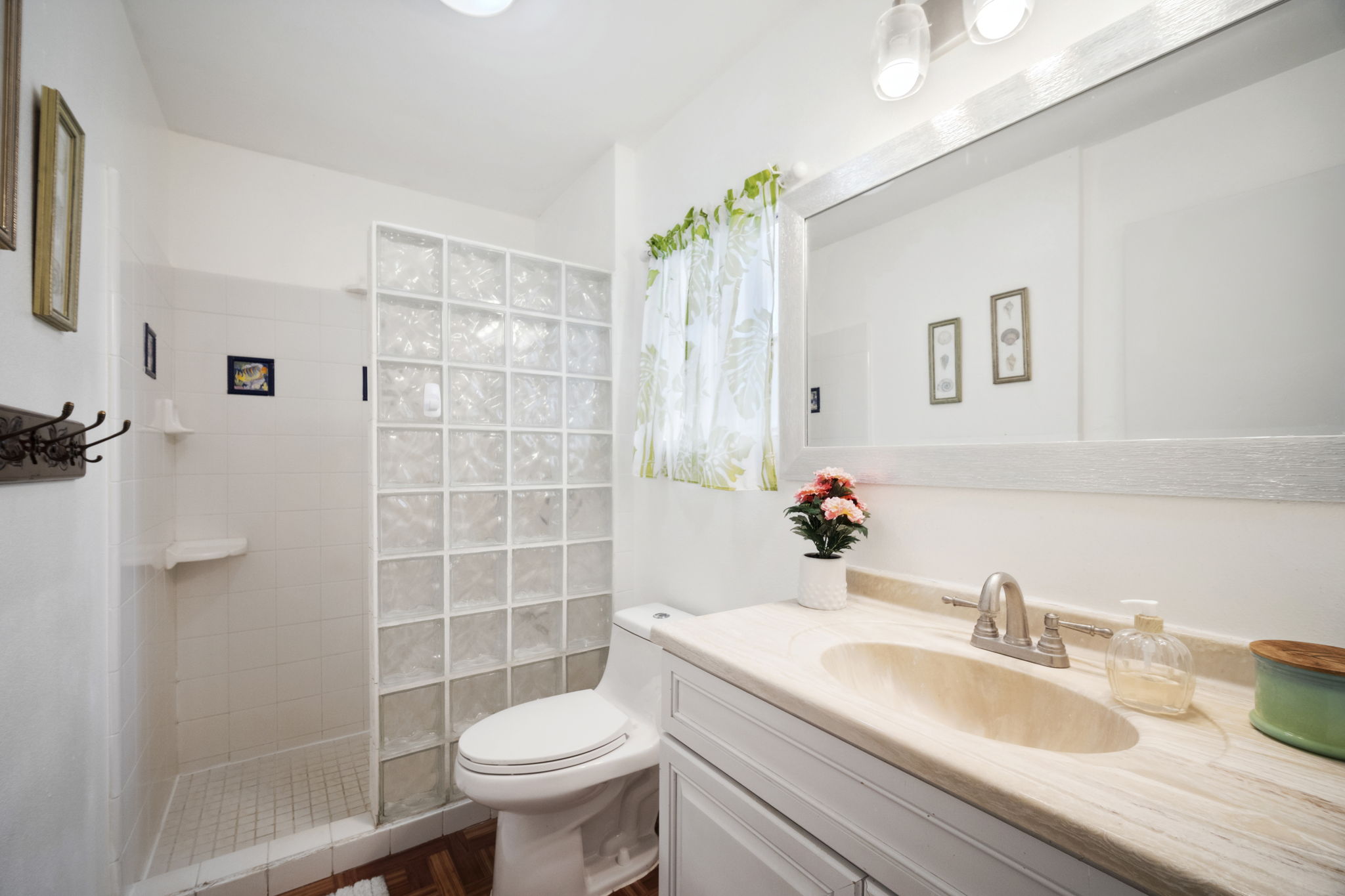 4439 Punee Road Koloa, HI 96756 - Photo 19 of 30 a bathroom with a sink toilet and shower