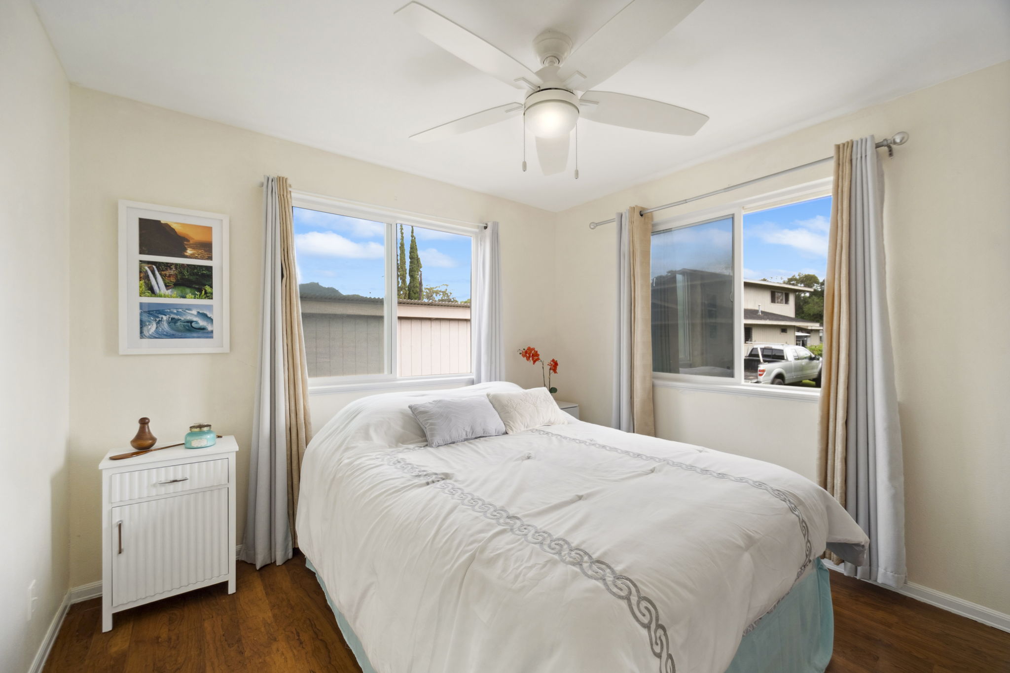 4439 Punee Road Koloa, HI 96756 - Photo 9 of 30 a bedroom with a large bed and a window