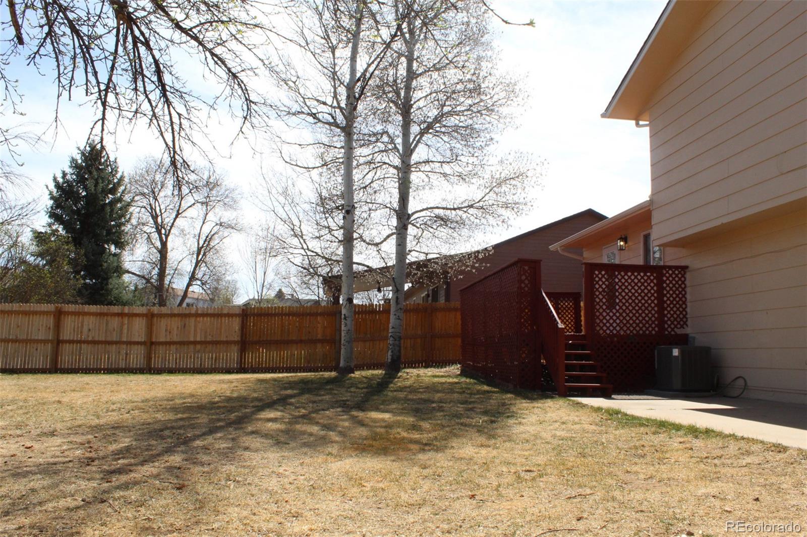 138 48th Avenue Greeley, CO 80634 - Photo 23 of 29 a view of a backyard of the house