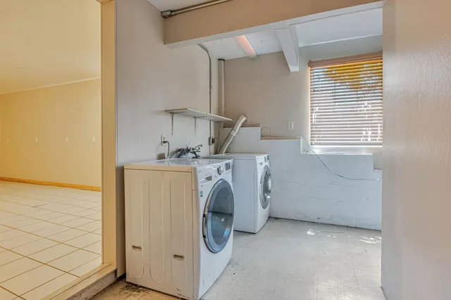 a view of a backyard of the house