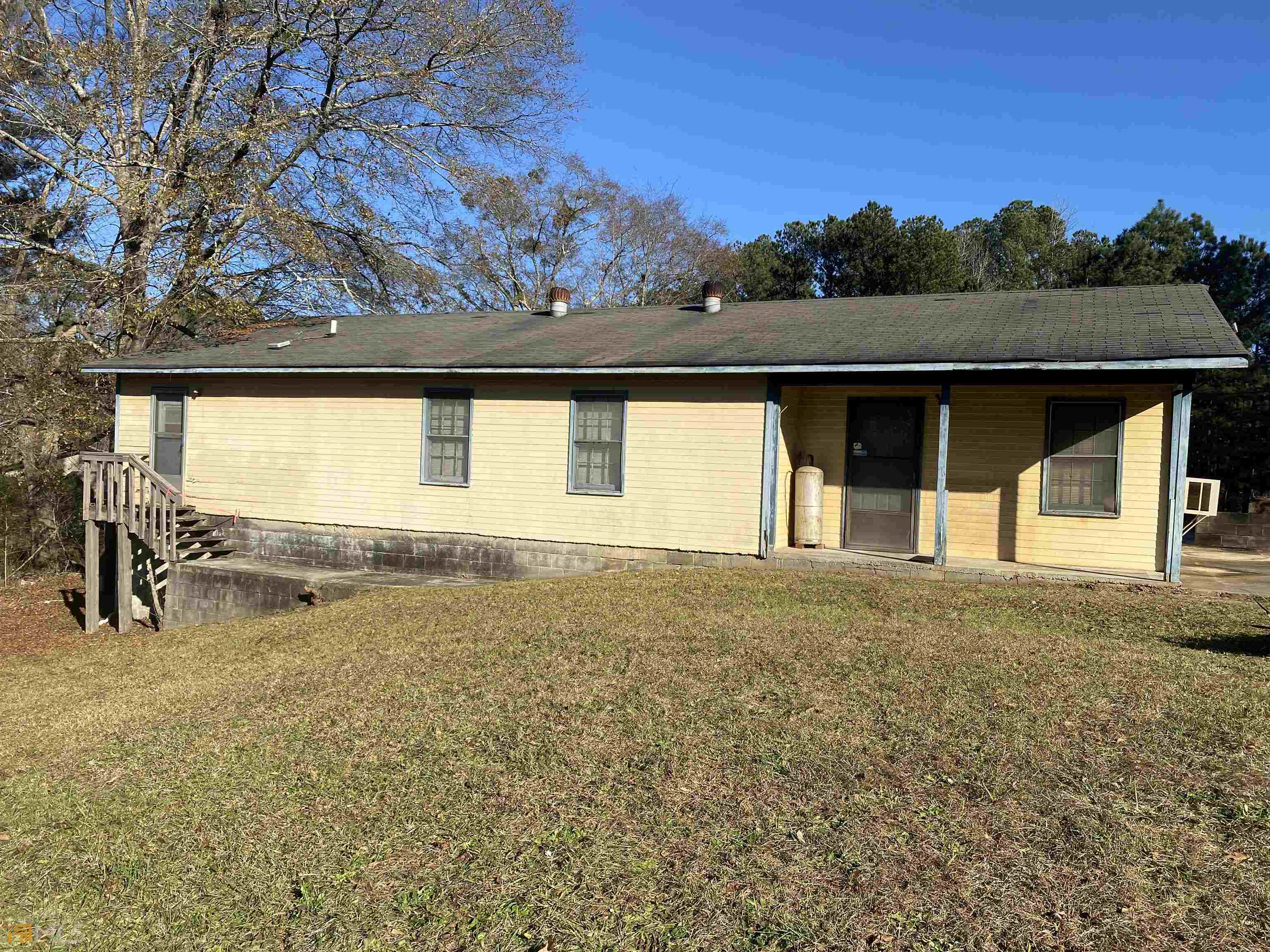 1420 Minter Road Griffin, GA 30223 - Photo 1 of 1 a view of an house with backyard space