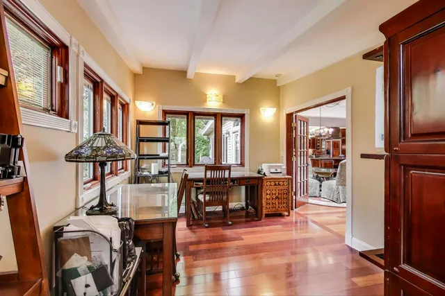 a living room with furniture and a rug
