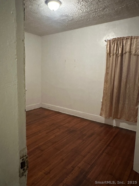 54 James Street, Unit 1 Bridgeport, CT 06604 - Photo 4 of 8 a view of wooden floor