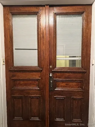 a bathroom with a sink a vanity and a window