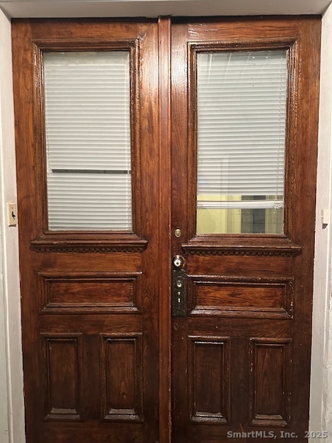 54 James Street, Unit 1 Bridgeport, CT 06604 - Photo 7 of 8 a bathroom with a sink a vanity and a window