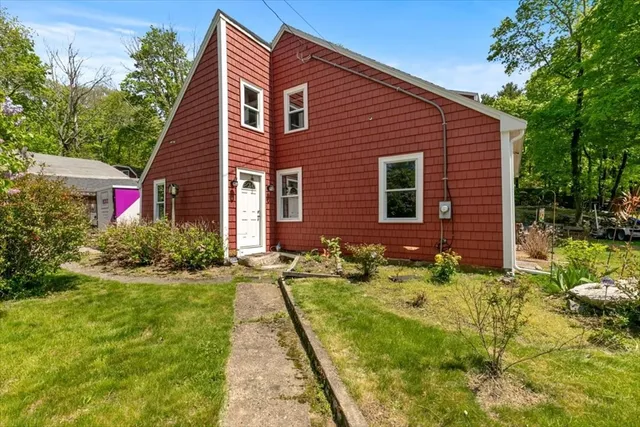 a front view of house with yard