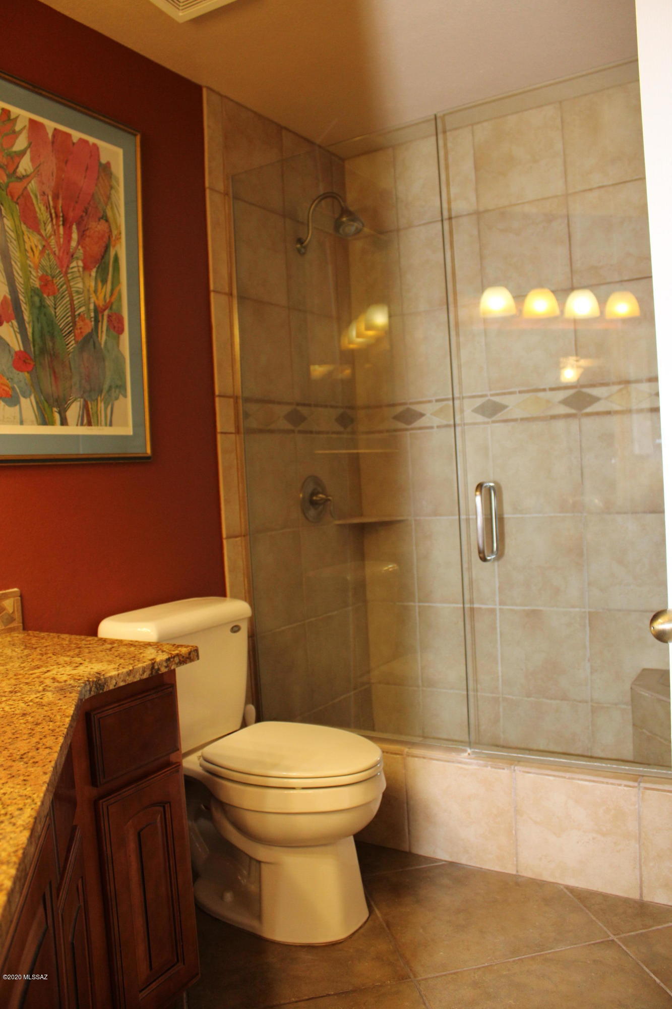 5751 North Kolb Road, Unit 36203 Tucson, AZ 85750 - Photo 19 of 25 a bathroom with a toilet and a shower