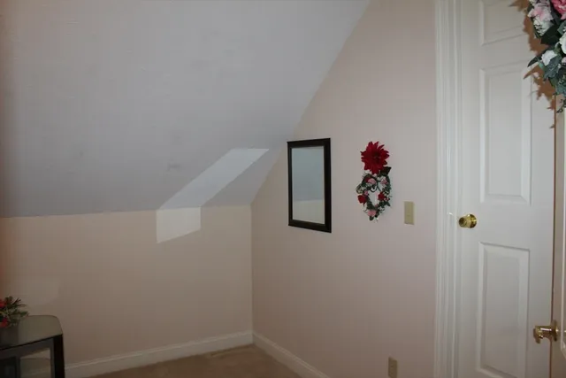 a view of a hallway with a closet