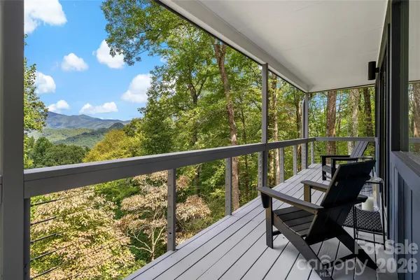 a view of a two chair in the balcony