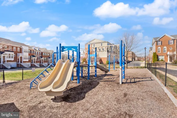 a view of a park with swings