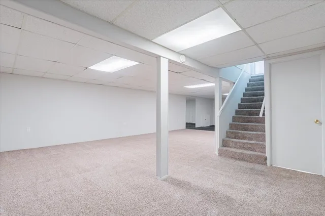 en view of an empty room with stairs
