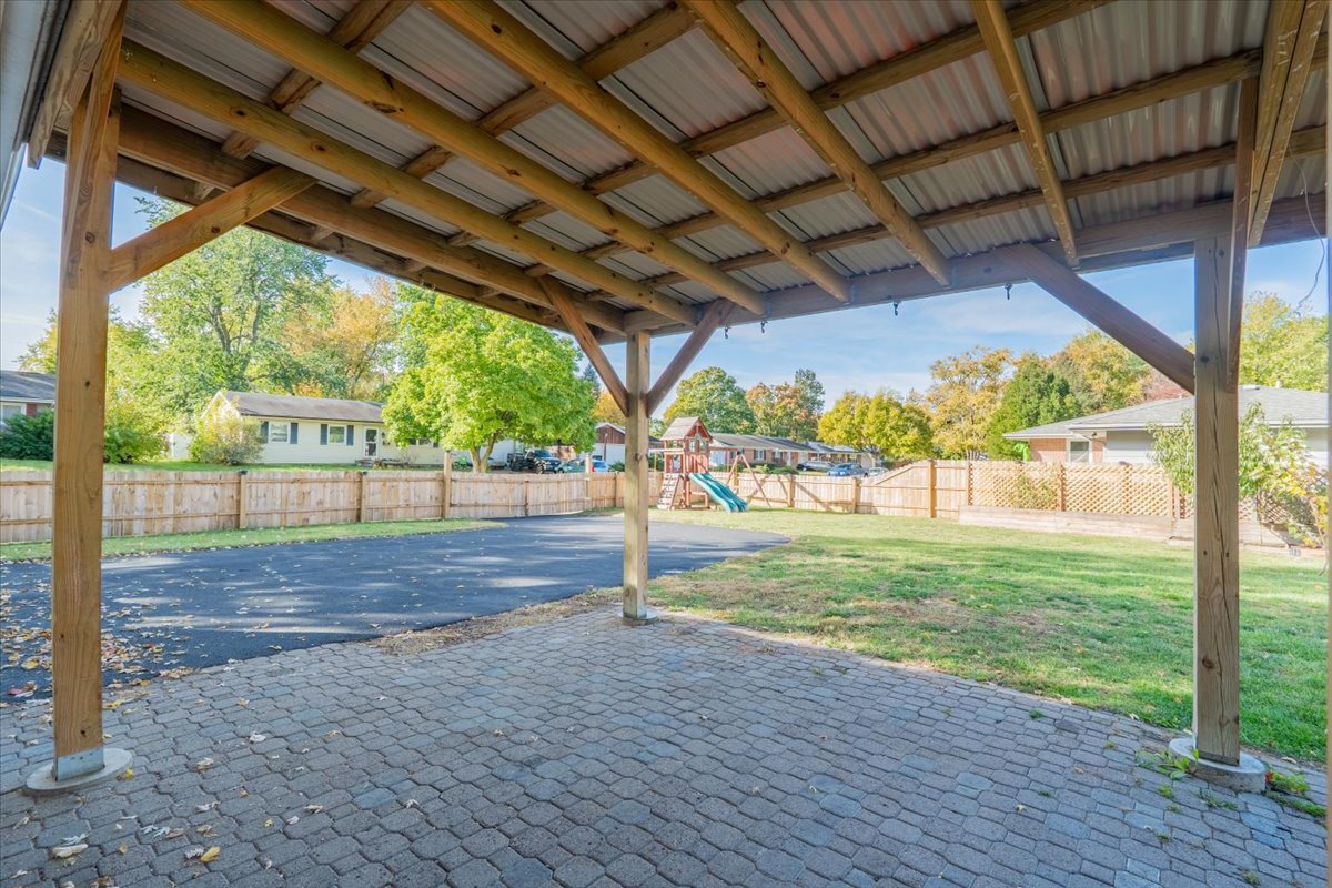 305 Highpoint Road Normal, IL 61761 - Photo 23 of 29 a view of a yard with porch and sitting area