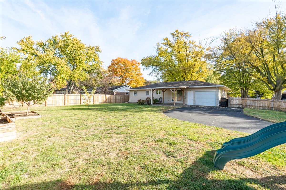 305 Highpoint Road Normal, IL 61761 - Photo 26 of 29 a front view of a house with a yard