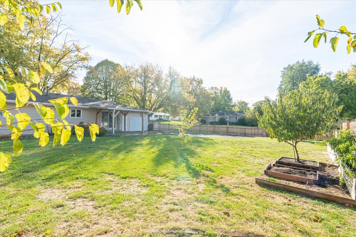 305 Highpoint Road Normal, IL 61761 - Photo 27 of 29 a view of a swimming pool with a yard