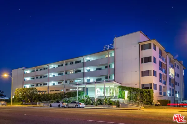 a large building with a street