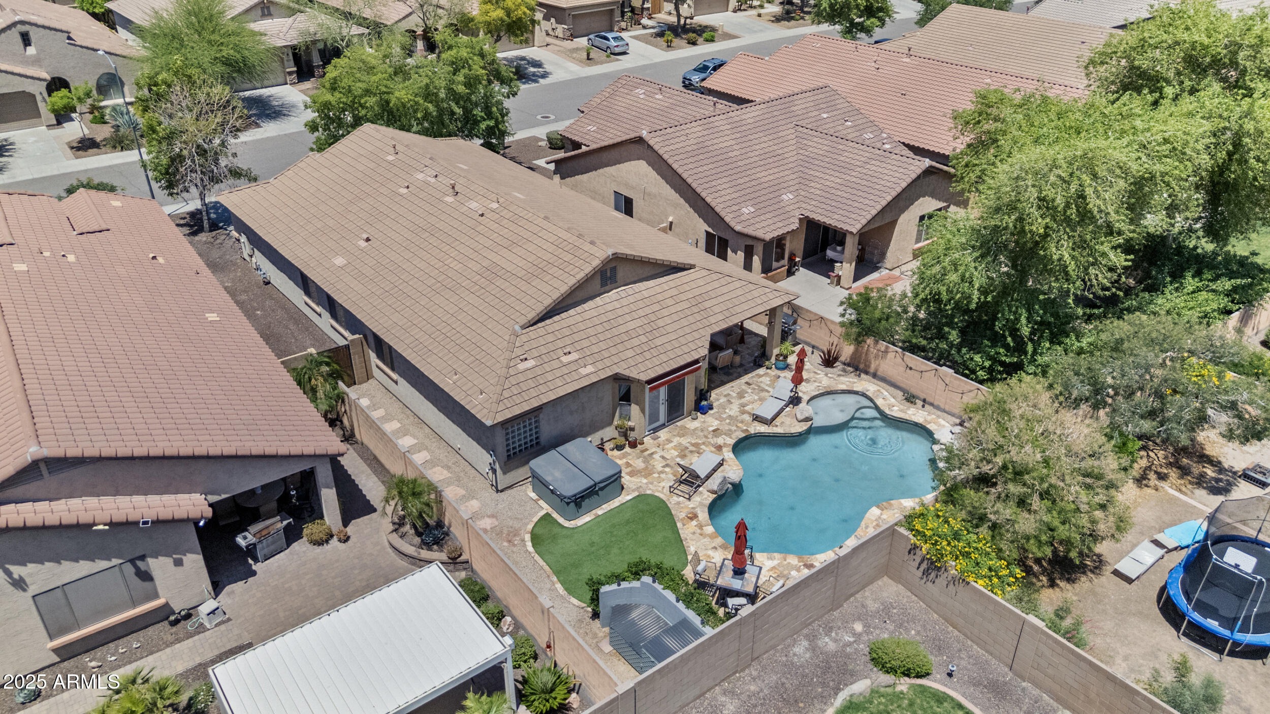 5303 West Hackamore Drive Phoenix, AZ 85083 - Photo 30 of 33 an aerial view of a house with a yard