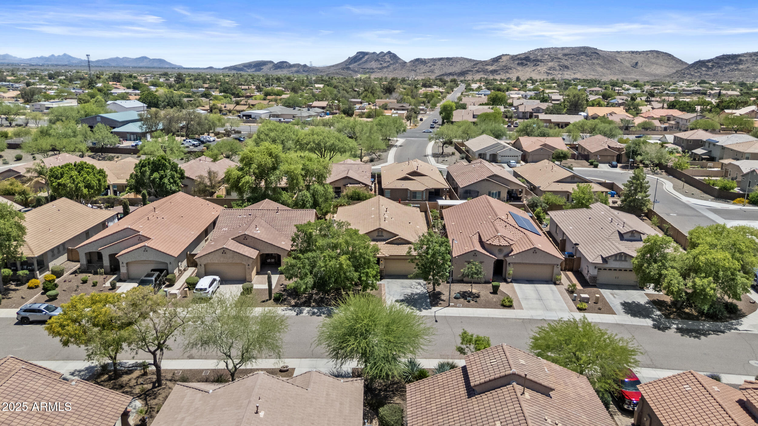 5303 West Hackamore Drive Phoenix, AZ 85083 - Photo 32 of 33 an aerial view of residential houses with outdoor space and trees