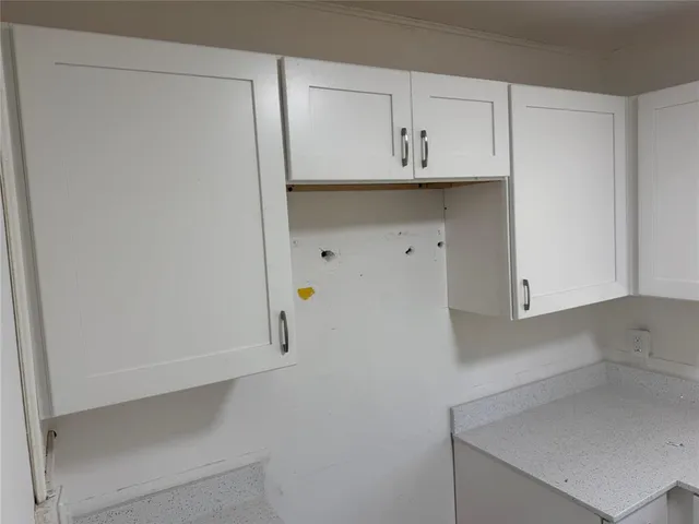 a bathroom with a sink a toilet a bathtub and a shower