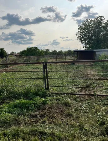 a view of lake with green space