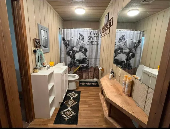 a hallway with furniture and a couch